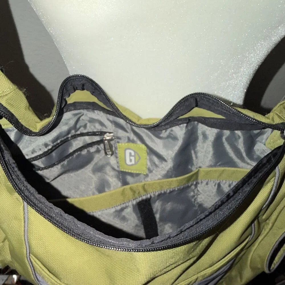 Go GaGa messenger-style diaper bag features a unique olive green and gray color